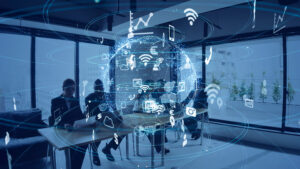 Smart office concept. People seated in meeting room with tech symbols superimposed.