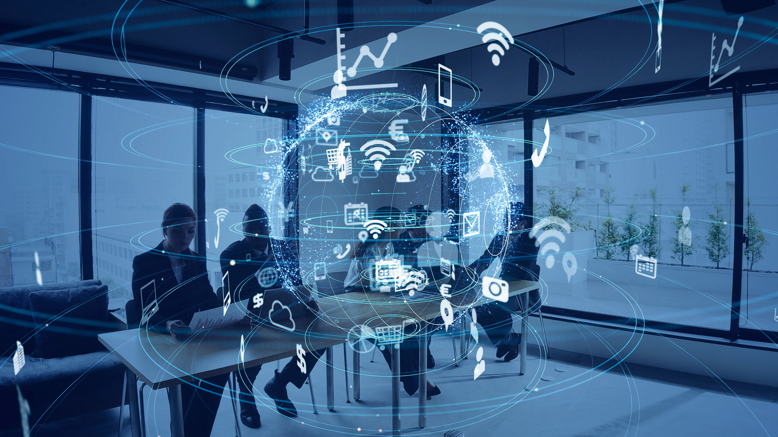 Smart office concept. People seated in meeting room with tech symbols superimposed.
